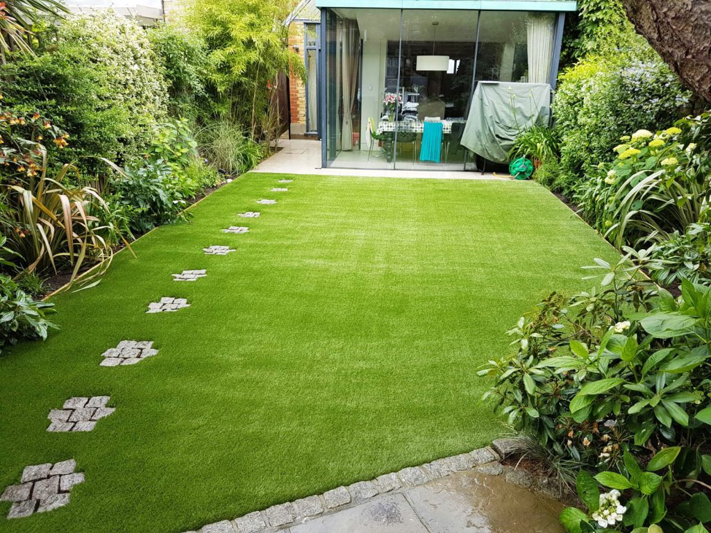 Transforming Outdoor Spaces: Artificial Grass Installation and Top Soil Supply